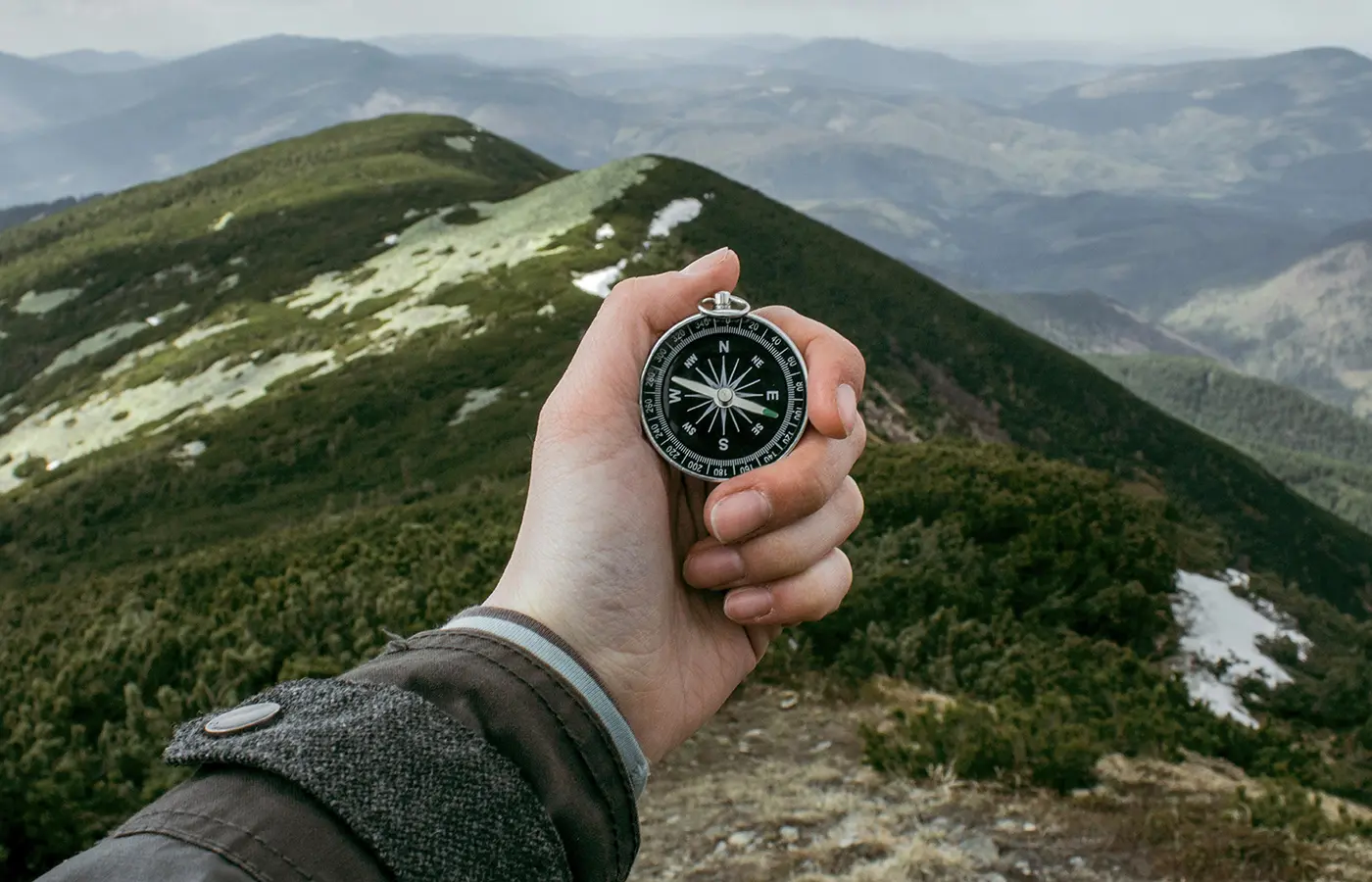 Hand with compass